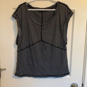 Black and gray striped shirt with mesh panel in the back